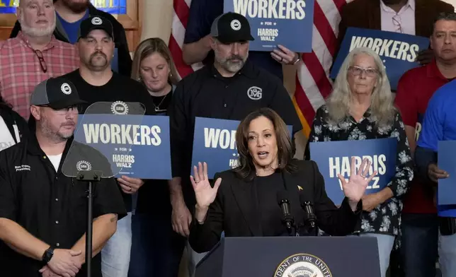 Democratic presidential nominee Vice President Kamala Harris speaks at UAW Local 652 during a campaign event in Lansing, Mich., Friday, Oct. 18, 2024. (AP Photo/Jacquelyn Martin)