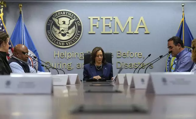 Democratic presidential nominee Vice President Kamala Harris attends a briefing at FEMA headquarters, Monday, Sept. 30, 2024, in Washington, on recovery and assistance efforts after Hurricane Helene. (AP Photo/Jacquelyn Martin)