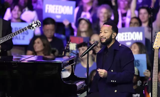 John Legend speaks at a campaign rally with former President Barack Obama supporting Democratic presidential nominee Vice President Kamala Harris, Monday, Oct. 28, 2024, in Philadelphia. (AP Photo/Matt Rourke)