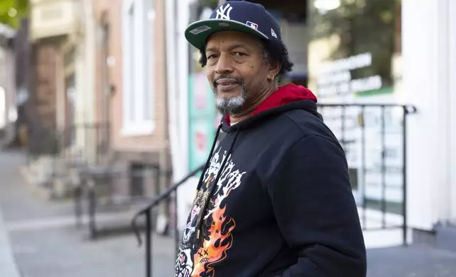 Dominican American voter Franklin Encarnacion, 58, who plans to vote for Democratic nominee Vice President Kamala Harris in the 2024 presidential election, poses in Allentown, Pa., Tuesday, Oct. 15, 2024. (AP Photo/Ryan Collerd)