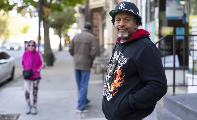 Dominican American voter Franklin Encarnacion, 58, who plans to vote for Democratic nominee Vice President Kamala Harris in the 2024 presidential election, poses in Allentown, Pa., Tuesday, Oct. 15, 2024. (AP Photo/Ryan Collerd)