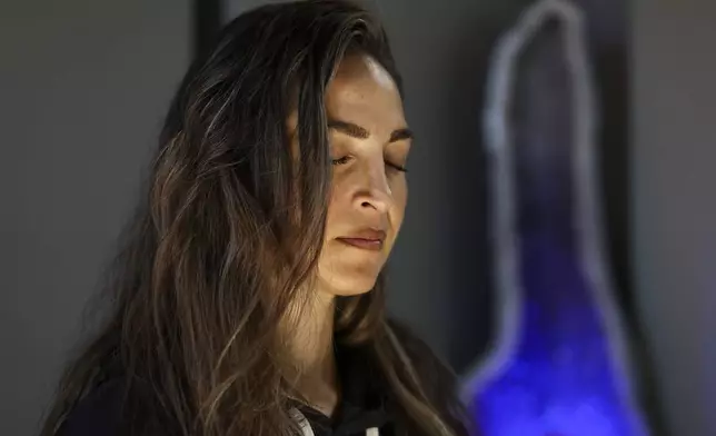 Headspace meditation teacher, Rosie Acosta, meditates in her studio Monday, Sept. 30, 2024, in Woodland Hills, Calif. (AP Photo/Jessie Alcheh)