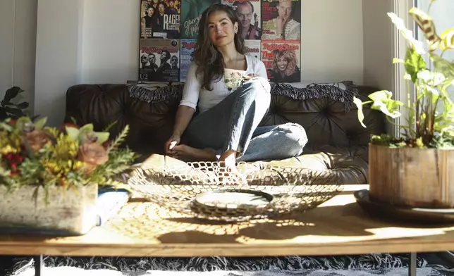 Headspace meditation teacher Rosie Acosta poses for a portrait in her living room, Monday, Sept. 30, 2024, in Woodland Hills, Calif. (AP Photo/Jessie Alcheh)