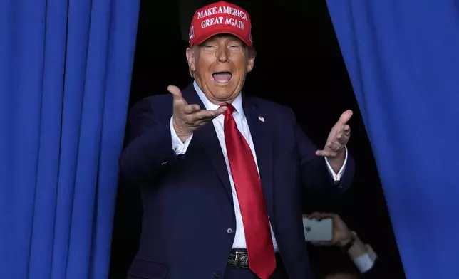 FILE - Republican presidential nominee former President Donald Trump arrives to speak during a campaign rally at Dodge County Airport, Sunday, Oct. 6, 2024, in Juneau, Wis. (AP Photo/Julia Demaree Nikhinson, File)