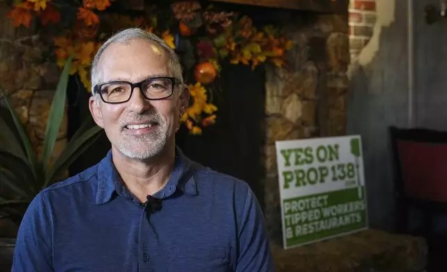 Dan Piacquadio, owner of Harold's Cave Creek Corral, poses for a photograph in his restaurant as he speaks about Arizona Prop 138 on minimum wage Thursday, Oct. 3, 2024, in Cave Creek, Ariz. (AP Photo/Ross D. Franklin)