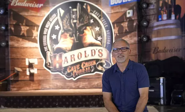 Dan Piacquadio, owner of Harold's Cave Creek Corral, pauses at the restaurant's concert stage as he awaits the results of the upcoming election results regarding Arizona Prop 138 on minimum wage Thursday, Oct. 3, 2024, in Cave Creek, Ariz. (AP Photo/Ross D. Franklin)