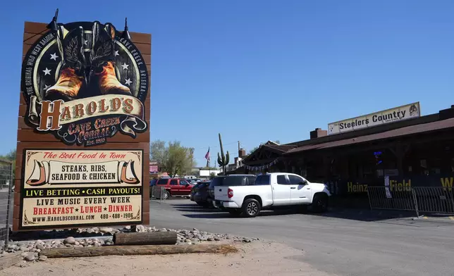 The front entrance of Harold's Cave Creek Corral, regarding Arizona Prop 138 on minimum wage Thursday, Oct. 3, 2024, in Cave Creek, Ariz. (AP Photo/Ross D. Franklin)