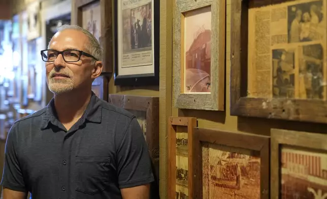 Dan Piacquadio, owner of Harold's Cave Creek Corral, poses for a photograph in his restaurant as he is very interested in the upcoming election and the results of Arizona Prop 138 on minimum wage Thursday, Oct. 3, 2024, in Cave Creek, Ariz. (AP Photo/Ross D. Franklin)