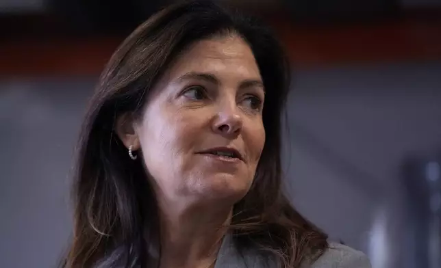 Republican gubernatorial candidate Kelly Ayotte, who faces Democrat Joyce Craig in the November 2024 election, answers a question during a visit to a local concrete coating business, Wednesday, Oct. 16, 2024, in Manchester, N.H. (AP Photo/Charles Krupa)