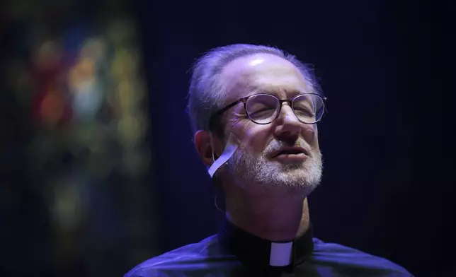 The Rev. David Peck, rector of St. James Episcopal Church, leads a "Contemplative Citizenship" service in Lancaster, Pa., on Tuesday, Oct. 15, 2024. (AP Photo/Jessie Wardarski)