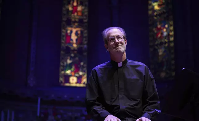 The Rev. David Peck, rector of St. James Episcopal Church, leads a "Contemplative Citizenship" service in Lancaster, Pa., on Tuesday, Oct. 15, 2024. (AP Photo/Jessie Wardarski)