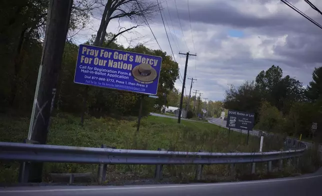 A voting advertisement geared toward the Amish population of Lancaster County is seen from the road in Strasburg, Pa., on Tuesday, Oct. 15, 2024. (AP Photo/Jessie Wardarski)