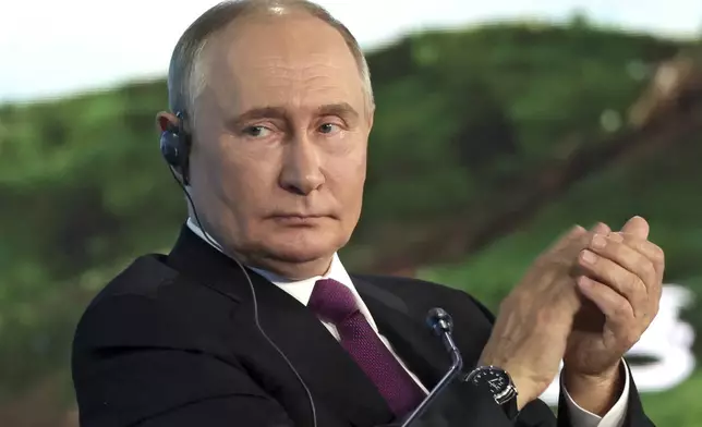 FILE - Russian President Vladimir Putin applauds during the Eastern Economic Forum in Vladivostok, Russia, on Sept. 5, 2024. (Vyacheslav Prokofyev, Sputnik, Kremlin Pool Photo via AP, File)