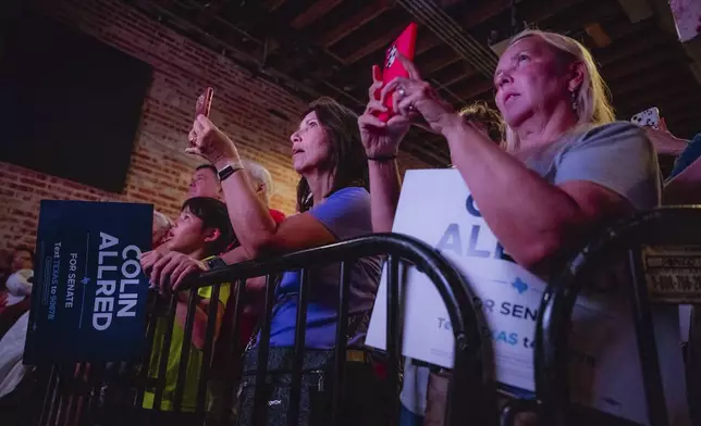 Supporters attend a campaign event for Rep. Colin Allred, D-Texas, at Tulips FTW, Saturday, Oct. 5, 2024, in Fort Worth, Texas. (AP Photo/Desiree Rios)