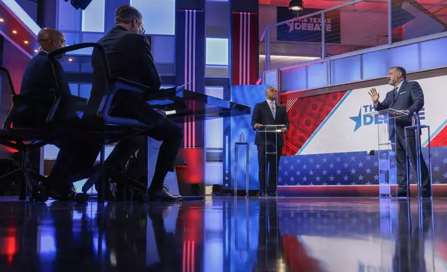 Sen. Ted Cruz, R-Texas, right, speaks during a U.S. Senate debate with Rep. Colin Allred, D-Texas, Tuesday, Oct. 15, 2024, in Dallas. (Shelby Tauber/Texas Tribune via AP, Pool)