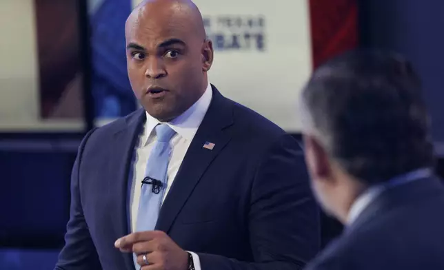 Rep. Colin Allred, D-Texas, left, speaks during a U.S. Senate debate with Sen. Ted Cruz, R-Texas, Tuesday, Oct. 15, 2024, in Dallas. (Shelby Tauber/Texas Tribune via AP, Pool)