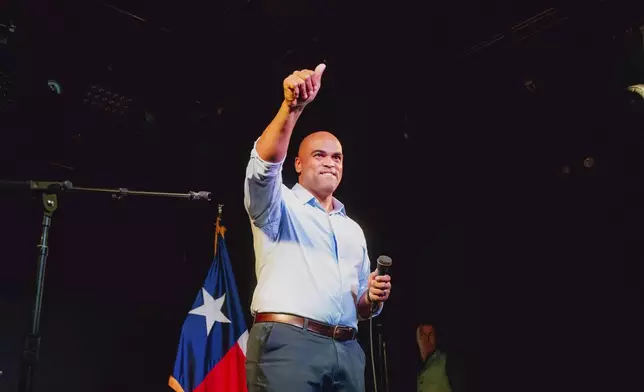 Rep. Colin Allred, D-Texas, waves to supporters at a campaign event at Tulips FTW, Saturday, Oct. 5, 2024, in Fort Worth, Texas. (AP Photo/Desiree Rios)