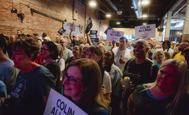 Supporters cheer at a campaign event for Rep. Colin Allred, D-Texas, at Tulips FTW, Saturday, Oct. 5, 2024, in Fort Worth, Texas. (AP Photo/Desiree Rios)