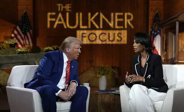 Republican presidential nominee former President Donald Trump speaks during a break in a Fox News town hall with Harris Faulkner at The Reid Barn, Tuesday, Oct. 15, 2024, in Cumming, Ga. (AP Photo/Julia Demaree Nikhinson)