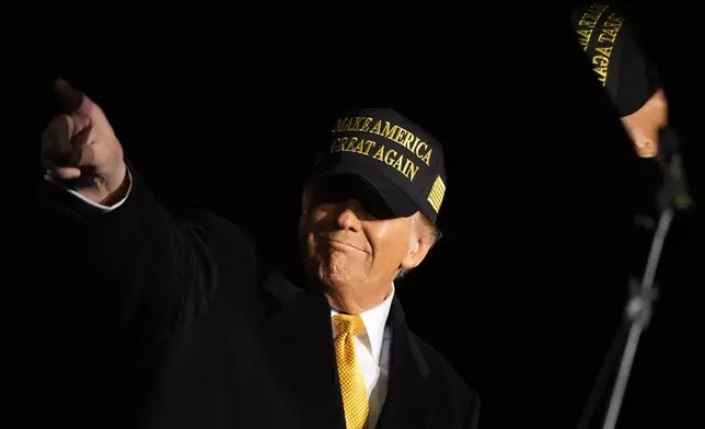 Republican presidential nominee former President Donald Trump speaks during a campaign rally at Cherry Capital Airport, Friday, Oct. 25, 2024, in Traverse City, Mich. (AP Photo/Alex Brandon)