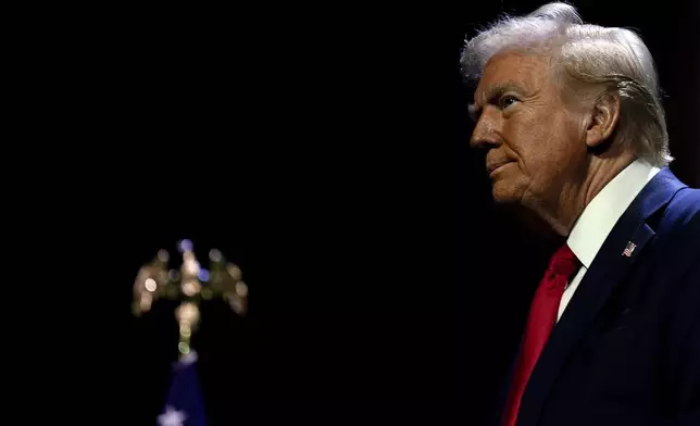 Republican presidential nominee former President Donald Trump arrives to speak at a meeting of the Detroit Economic Club, Thursday, Oct. 10, 2024, in Detroit. (AP Photo/Julia Demaree Nikhinson)