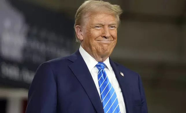 Republican presidential nominee former President Donald Trump arrives at a campaign event at Dane Manufacturing, Tuesday, Oct. 1, 2024, in Waunakee, Wis. (AP Photo/Charlie Neibergall)