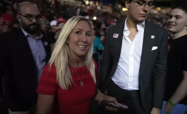 Rep. Marjorie Taylor Greene, R-Ga., arrives before Republican presidential nominee former President Donald Trump speaks at a campaign rally at McCamish Pavilion Monday, Oct. 28, 2024, in Atlanta. (AP Photo/Mike Stewart)