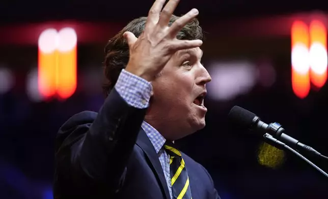 Tucker Carlson speaks before Republican presidential nominee former President Donald Trump at a campaign rally at Madison Square Garden, Sunday, Oct. 27, 2024, in New York. (AP Photo/Alex Brandon)