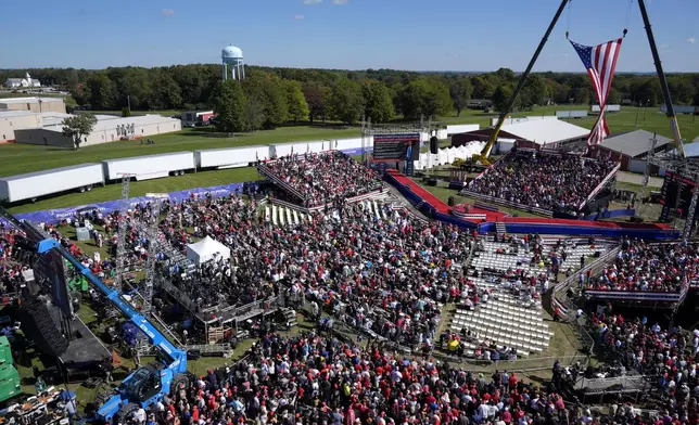 Supporters arrive before Republican presidential nominee former President Donald Trump speaks at a campaign event at the Butler Farm Show, Saturday, Oct. 5, 2024, in Butler, Pa. (AP Photo/Alex Brandon)