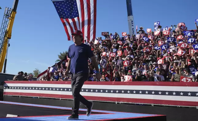 Dennis Quaid arrives to speak at a campaign rally for Republican presidential nominee former President Donald Trump at the Calhoun Ranch, Saturday, Oct. 12, 2024, in Coachella, Calif. (AP Photo/Alex Brandon)