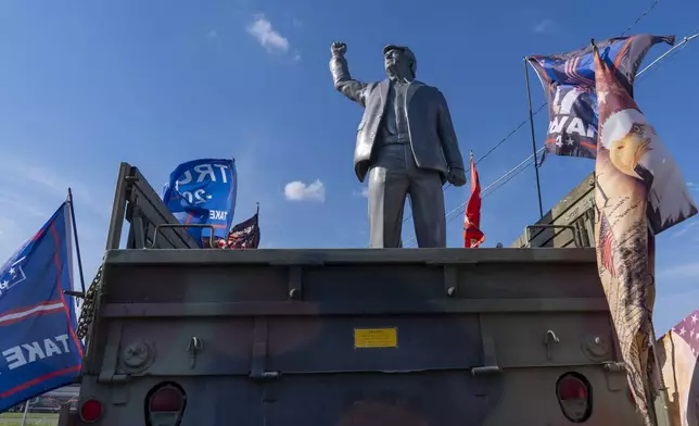 A statue of Republican presidential nominee former President Donald Trump is set up on a truck ahead of a campaign event at the Butler Farm Show, Friday, Oct. 4, 2024, in Butler, Pa. (AP Photo/Alex Brandon)