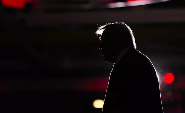 Republican presidential nominee former President Donald Trump walks from the stage at a campaign event at the Ryder Center at Saginaw Valley State University, Thursday, Oct. 3, 2024, in University Center, Mich. (AP Photo/Alex Brandon)