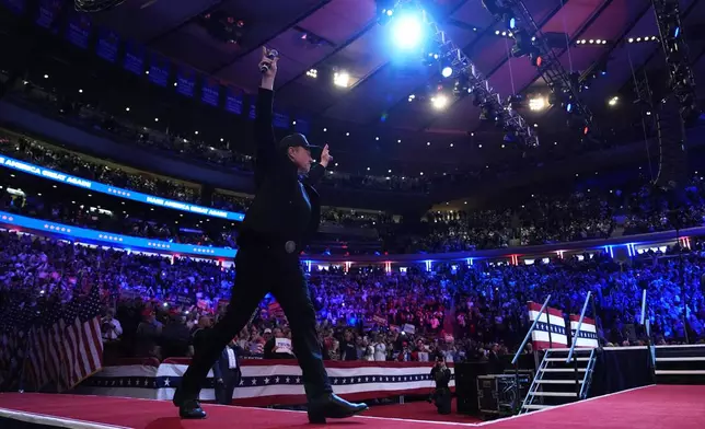 Elon Musk arrives to speak a campaign rally for Republican presidential nominee former President Donald Trump at Madison Square Garden, Sunday, Oct. 27, 2024, in New York. (AP Photo/Julia Demaree Nikhinson)