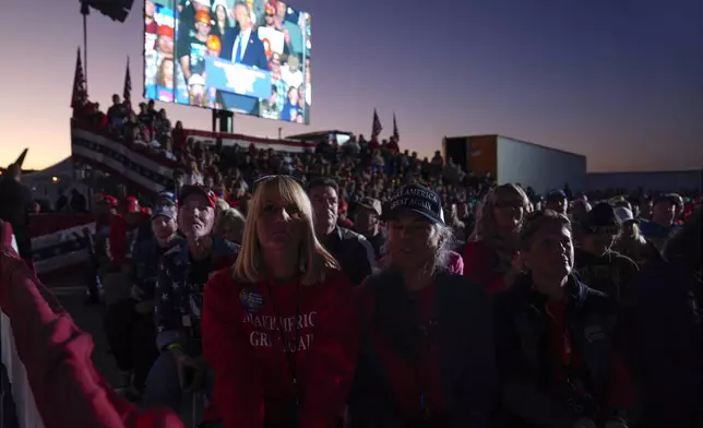 Supporters listen as Republican presidential nominee former President Donald Trump speaks during a campaign rally at Arnold Palmer Regional Airport, Saturday, Oct. 19, 2024, in Latrobe, Pa. (AP Photo/Evan Vucci)