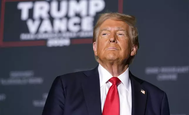 Republican presidential nominee former President Donald Trump arrives for a campaign rally at the Gaylord Rockies Resort &amp; Convention Center, Friday, Oct. 11, 2024, in Aurora, Colo. (AP Photo/Alex Brandon)