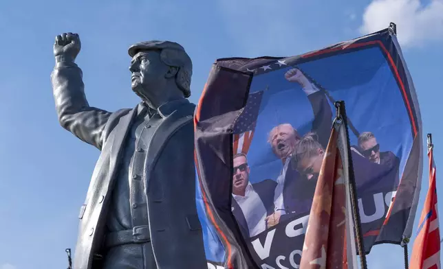 A statue of Republican presidential nominee former President Donald Trump is set up on a truck ahead of a campaign event at the Butler Farm Show, Friday, Oct. 4, 2024, in Butler, Pa. (AP Photo/Alex Brandon)