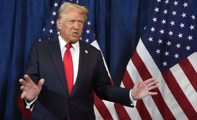 Republican presidential nominee former President Donald Trump talks backstage before he speaks at a campaign rally at the Gaylord Rockies Resort &amp; Convention Center, Friday, Oct. 11, 2024, in Aurora, Colo. (AP Photo/Alex Brandon)