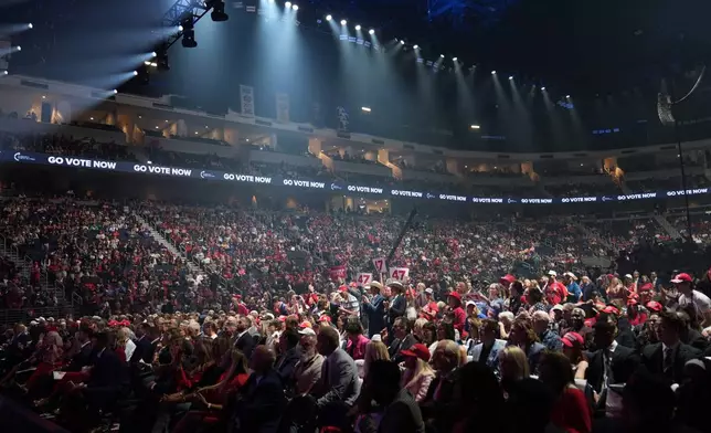 Supporters listen during a campaign rally with Republican presidential nominee former President Donald Trump Wednesday, Oct. 23, 2024, in Duluth, Ga. (AP Photo/Alex Brandon)