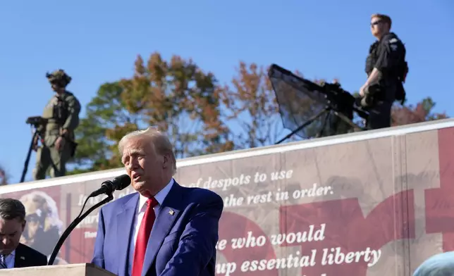 Republican presidential nominee former President Donald Trump speaks to an overflow crowd after a faith town hall at Christ Chapel Zebulon, Wednesday, Oct. 23, 2024, in Zebulon, Ga. (AP Photo/Alex Brandon)