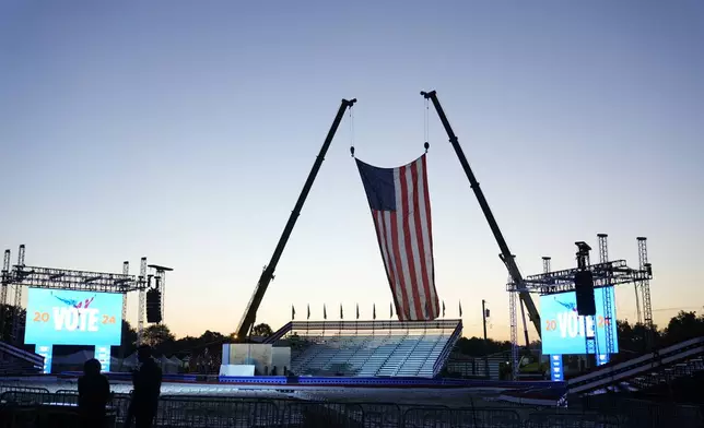 The campaign rally site is seen near sunrise before Republican presidential nominee former President Donald Trump speaks at the Butler Farm Show, the site where a gunman tried to assassinate him in July, Saturday, Oct. 5, 2024, in Butler, Pa. (AP Photo/Alex Brandon)