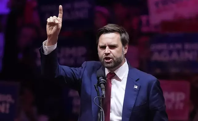 Republican vice presidential nominee Sen. JD Vance, R-Ohio, speaks before Republican presidential nominee former President Donald Trump at a campaign rally at Madison Square Garden, Sunday, Oct. 27, 2024, in New York. (AP Photo/Evan Vucci)