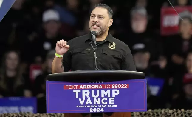 Paul Perez, president of the National Border Patrol Council, speaks before Republican presidential nominee former President Donald Trump at a campaign rally at the Findlay Toyota Arena Sunday, Oct. 13, 2024, in Prescott Valley, Ariz. (AP Photo/Ross D. Franklin)