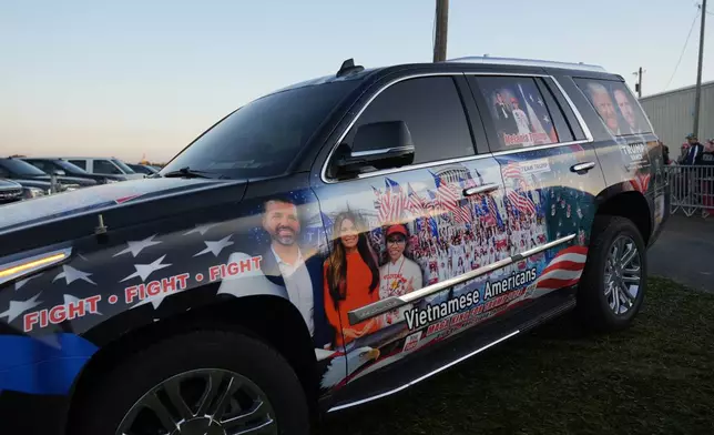 Supporters arrive before Republican presidential nominee former President Donald Trump speaks at a campaign rally at the Butler Farm Show, the site where a gunman tried to assassinate him in July, Saturday, Oct. 5, 2024, in Butler, Pa. (AP Photo/Alex Brandon)