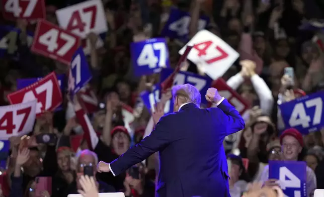 Republican presidential nominee former President Donald Trump dances at a town hall in Lancaster, Pa., Sunday, Oct. 20, 2024. (AP Photo/Susan Walsh)