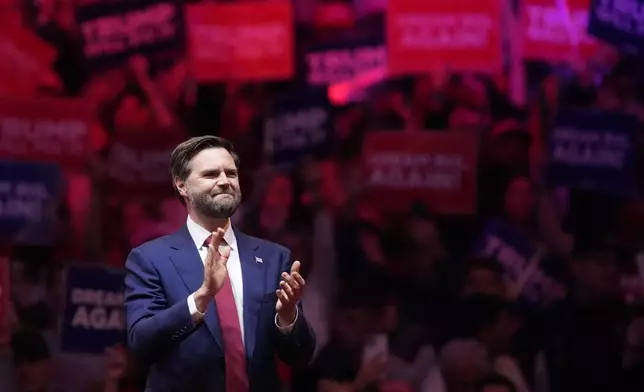 Republican vice presidential nominee Sen. JD Vance, R-Ohio, arrives before Republican presidential nominee former President Donald Trump at a campaign rally at Madison Square Garden, Sunday, Oct. 27, 2024, in New York. (AP Photo/Evan Vucci)