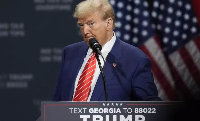 Republican presidential nominee former President Donald Trump speaks at a campaign event at the Cobb Energy Performing Arts Centre, Tuesday, Oct. 15, 2024, in Atlanta. (AP Photo/John Bazemore)