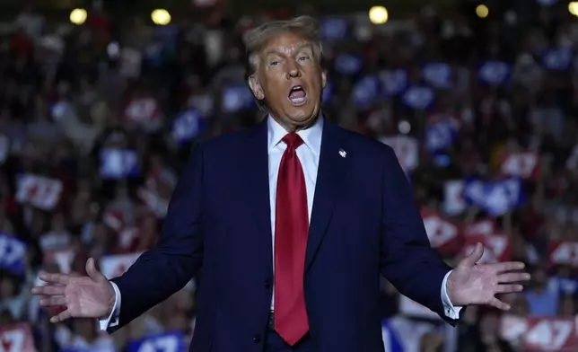 Republican presidential nominee former President Donald Trump speaks during a campaign rally at McCamish Pavilion Monday, Oct. 28, 2024, in Atlanta, Ga. (AP Photo/Julia Demaree Nikhinson)