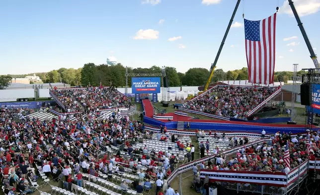 Supporters arrive before Republican presidential nominee former President Donald Trump speaks at a campaign event at the Butler Farm Show, Saturday, Oct. 5, 2024, in Butler, Pa. (AP Photo/Alex Brandon)