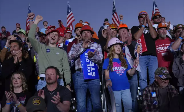 Supporters listen as Republican presidential nominee former President Donald Trump speaks during a campaign rally at Arnold Palmer Regional Airport, Saturday, Oct. 19, 2024, in Latrobe, Pa. (AP Photo/Evan Vucci)