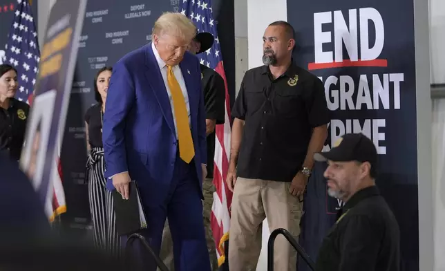 Republican presidential nominee former President Donald Trump departs after speaking at a news conference at Austin-Bergstrom International Airport, Friday, Oct. 25, 2024, in Austin, Texas. (AP Photo/Alex Brandon)